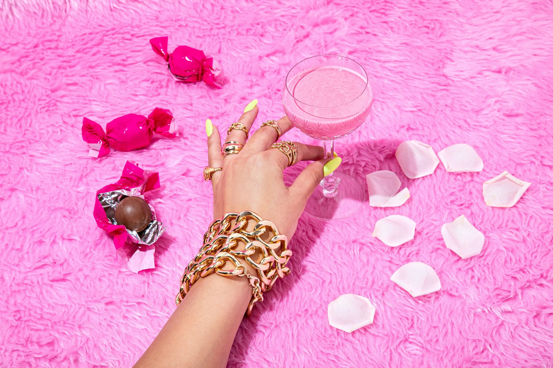 person wearing gold bracelet and gold bracelet